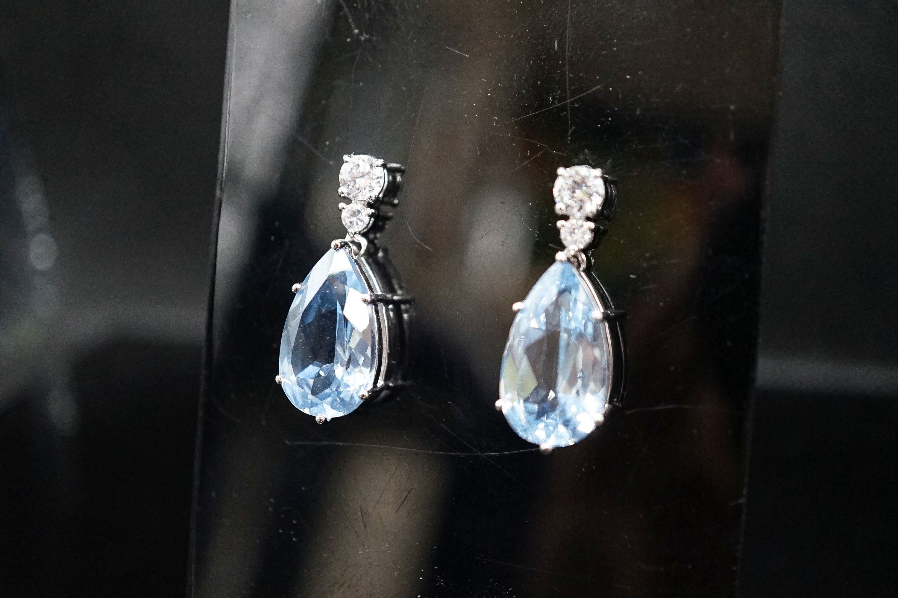 A pair of white metal and two colour cubic zirconia set pear shaped drop earrings, 30mm.